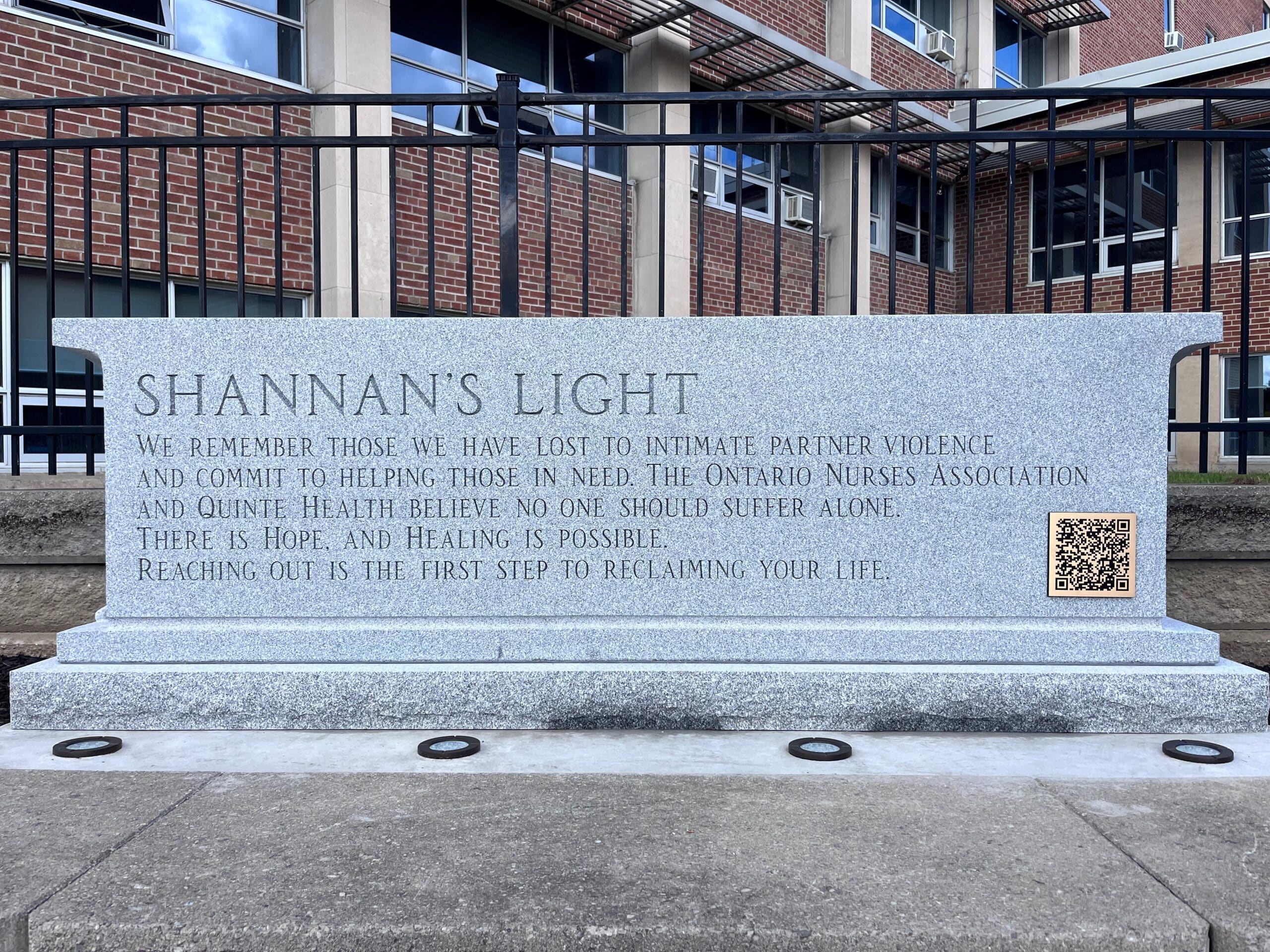 Shannan's Light monument outside Belleville General Hospital with its remembrance inscription and QR code