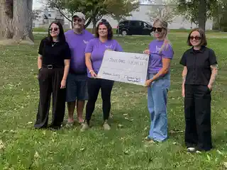 Cheque presentation supporting Three Oaks Foundation at the 1st Annual Shannan Hickey Memorial Golf Tournament