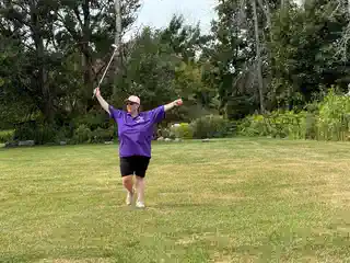 Golfer holding a club on the tournament course