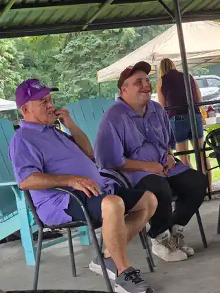 Tournament guests sharing a community moment