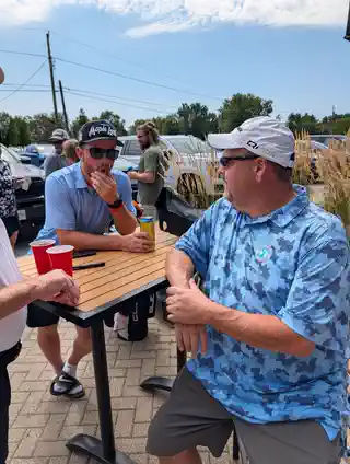Attendees sharing a moment during the tournament