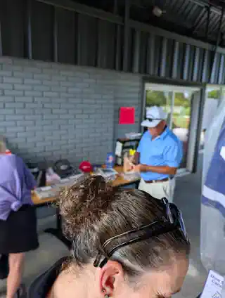Guests near the tournament prize table