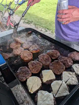 Burgers being prepared for the tournament meal