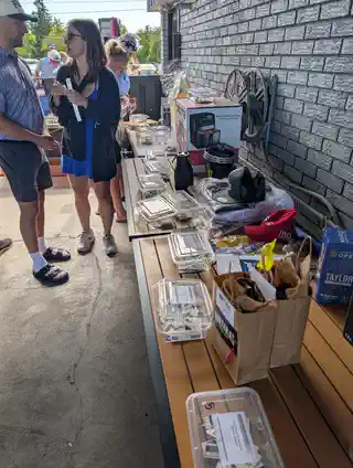 Guests browsing the tournament prize table