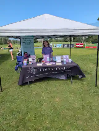 Three Oaks Foundation information tent at the golf tournament