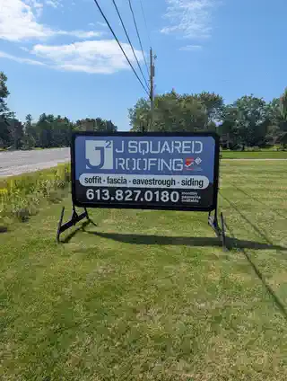 J² Squared Roofing roadside sponsor sign